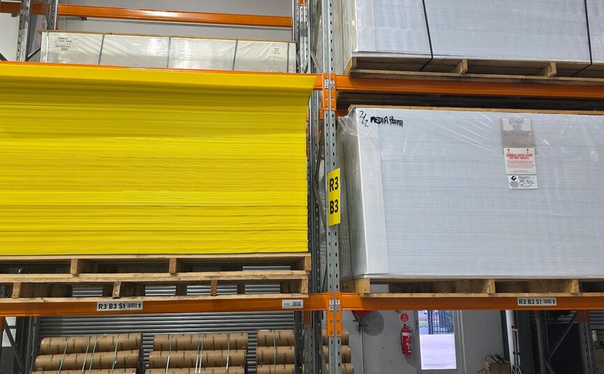 ellow and white Corflute sheets stored at Mediapoint